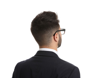 Young businessman in suit on white background
