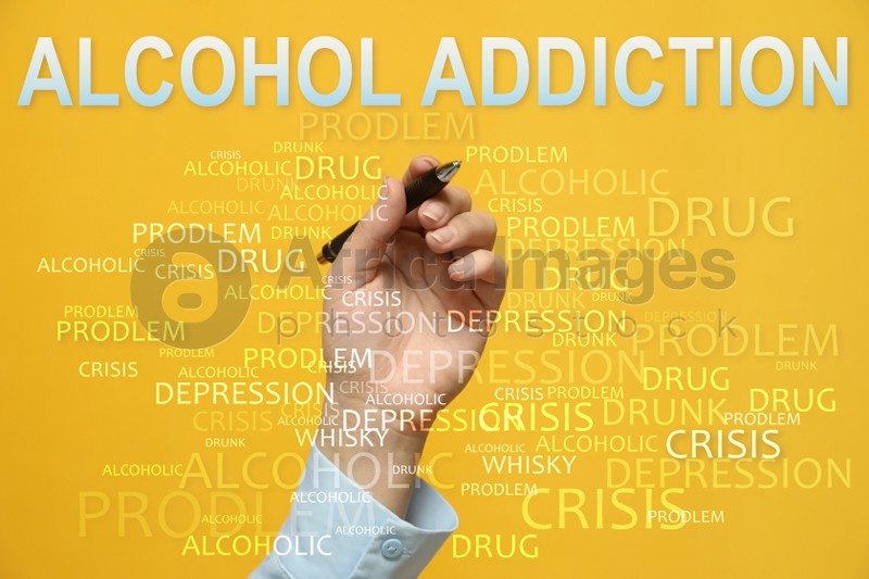 Alcohol addiction? - We can help you. Closeup view of woman with pen against yellow background