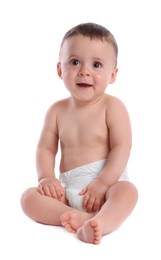 Cute baby in dry soft diaper sitting isolated on white