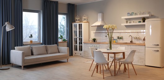 Image of Modern kitchen interior with new stylish furniture. Banner design