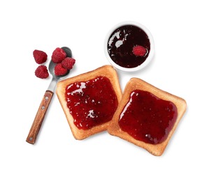 Crispy toasts with jam, spoon and raspberries on white background, top view