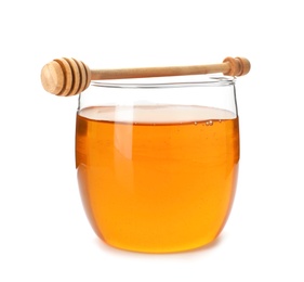 Jar with delicious honey and dipper on white background