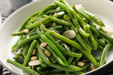 Bowl of tasty salad with green beans, closeup view