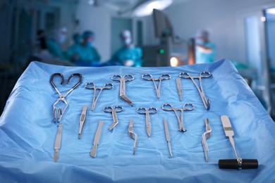 Different surgical instruments on table in operating room