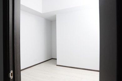 Photo of Empty office room with white walls. Interior design