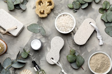 Photo of Flat lay composition with pumice stones on grey background