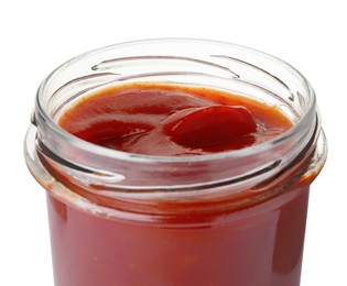 Glass jar of delicious ketchup isolated on white, closeup