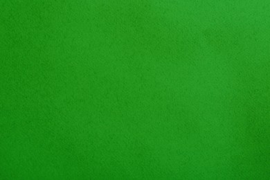 Image of Textured bright green background. Chroma key compositing