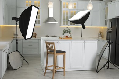Professional photo studio equipment prepared for shooting kitchen interior