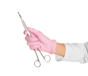 Doctor in sterile glove with medical forceps on white background