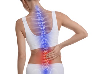 Woman suffering from pain in back on white background, closeup