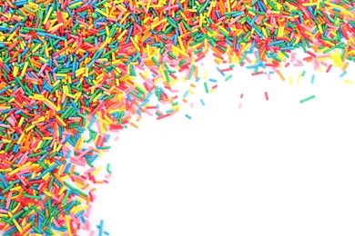 Colorful sprinkles on white background, top view. Confectionery decor