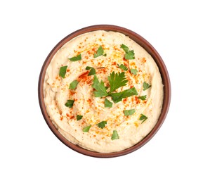 Tasty hummus with parsley and paprika in bowl isolated on white, top view