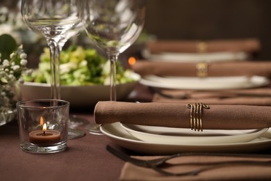 Stylish elegant table setting for festive dinner in restaurant