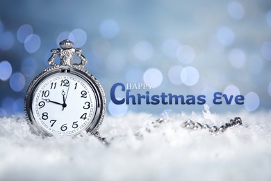 Happy Christmas Eve, postcard design. Pocket watch on snow against blurred lights 