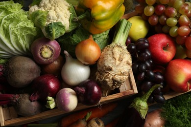 Photo of Different fresh vegetables in wooden crates as background, top view. Farmer harvesting