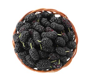 Ripe black mulberries in wicker bowl on white background, top view
