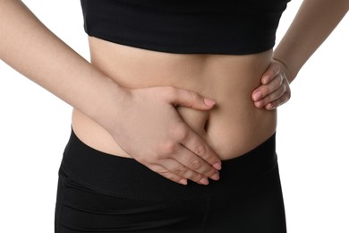 Woman suffering from pain in lower right abdomen on white background, closeup. Acute appendicitis