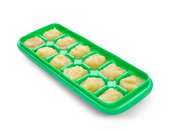 Apple puree in ice cube tray isolated on white. Ready for freezing