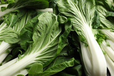 Fresh green pak choy cabbages as background, closeup