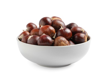 Fresh sweet edible chestnuts in bowl on white background