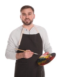 Man with painting tools on white background. Young artist