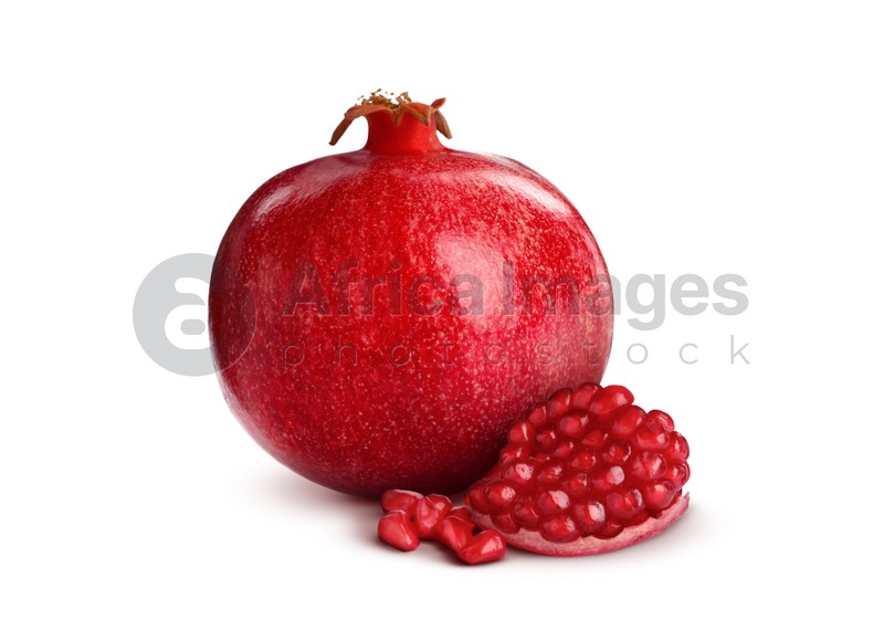 Fresh ripe juicy pomegranates on white background