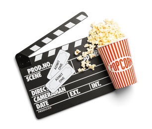Clapperboard, popcorn and tickets on white background, top view. Cinema snack