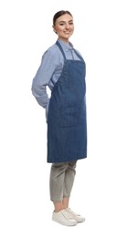 Beautiful young woman in clean denim apron on white background