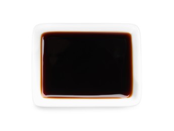 Bowl of tasty soy sauce isolated on white, top view