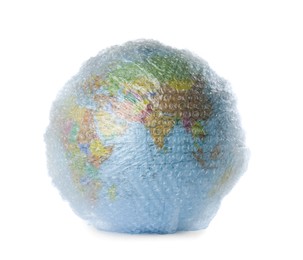 Photo of Globe packed in bubble wrap isolated on white. Environmental conservation