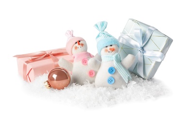 Cute snowmen and Christmas decoration on white background