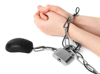 Woman chained to computer mouse on white background, closeup. Internet addiction