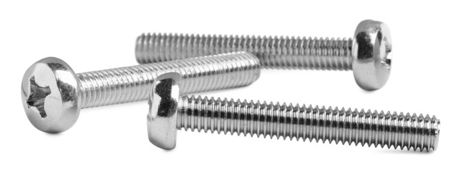 Three metal machine screw bolts isolated on white