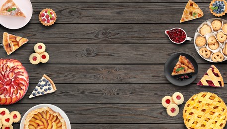 Image of Many different delicious pies on wooden table, flat lay. Space for text 