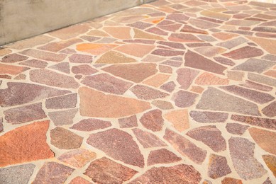 Beautiful pavement with stone fragments as background