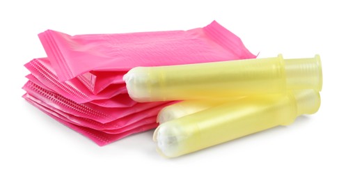 Pads and tampons on white background. Menstrual hygiene product