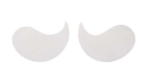 Under eye patches on white background, top view. Cosmetic product