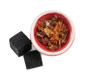 Hookah bowl with tobacco and charcoal cubes on white background, top view