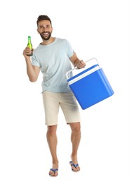 Happy man with cool box and bottle of beer on white background