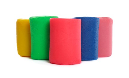 Different colorful play dough on white background