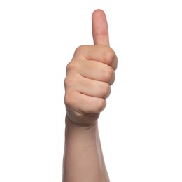 Woman showing thumb up on white background, closeup
