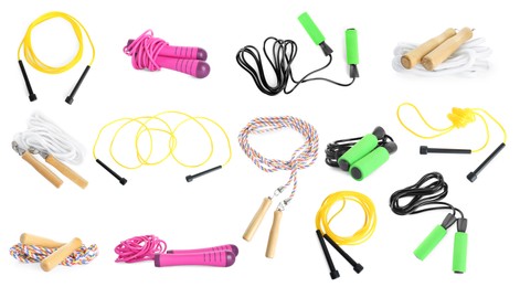 Set with different skipping ropes on white background