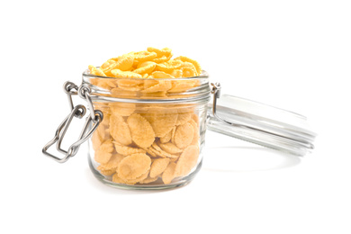Glass jar with corn flakes isolated on white