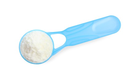 Scoop of powdered infant formula on white background, top view. Baby milk