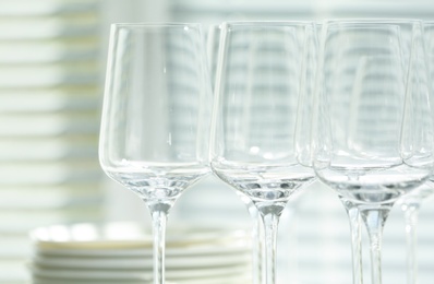 Set of empty wine glasses on blurred background, closeup
