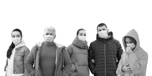 Group of people wearing medical face masks on light background. Black and white photography