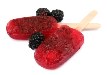 Delicious ice pops and fresh blackberries on white background. Fruit popsicle