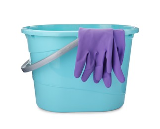 Photo of Light blue bucket with gloves for cleaning isolated on white