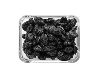 Bowl with raisins on white background, top view. Healthy dried fruit
